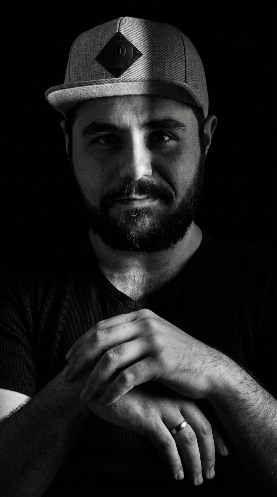 Black-and-white portrait of Siavash Kaafi